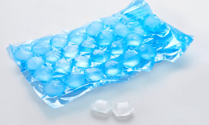 Blue plastic packaging ice bags for home water freezing.